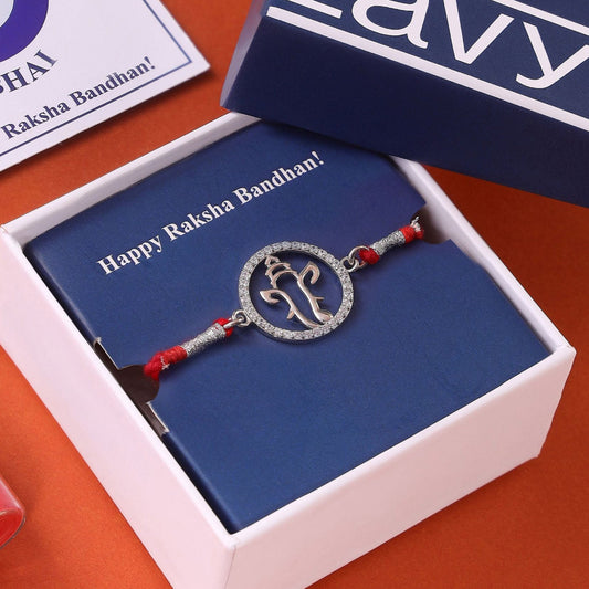 Radiant Ganesh Ji With CZ Silver Thread Rakhi