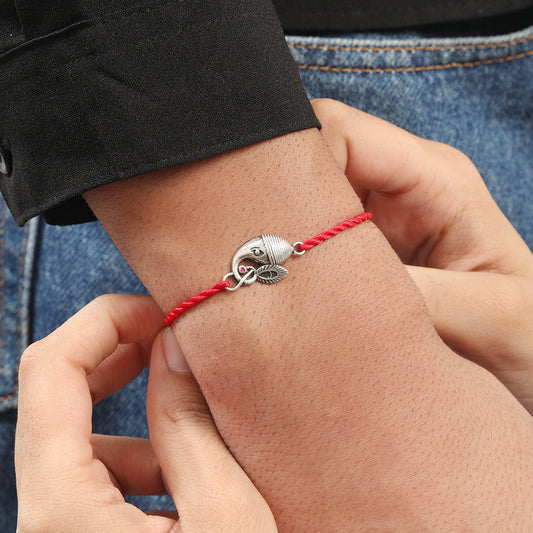 Divine Ganesh Ji Rhodium-Plated Sterling Silver Thread Rakhi