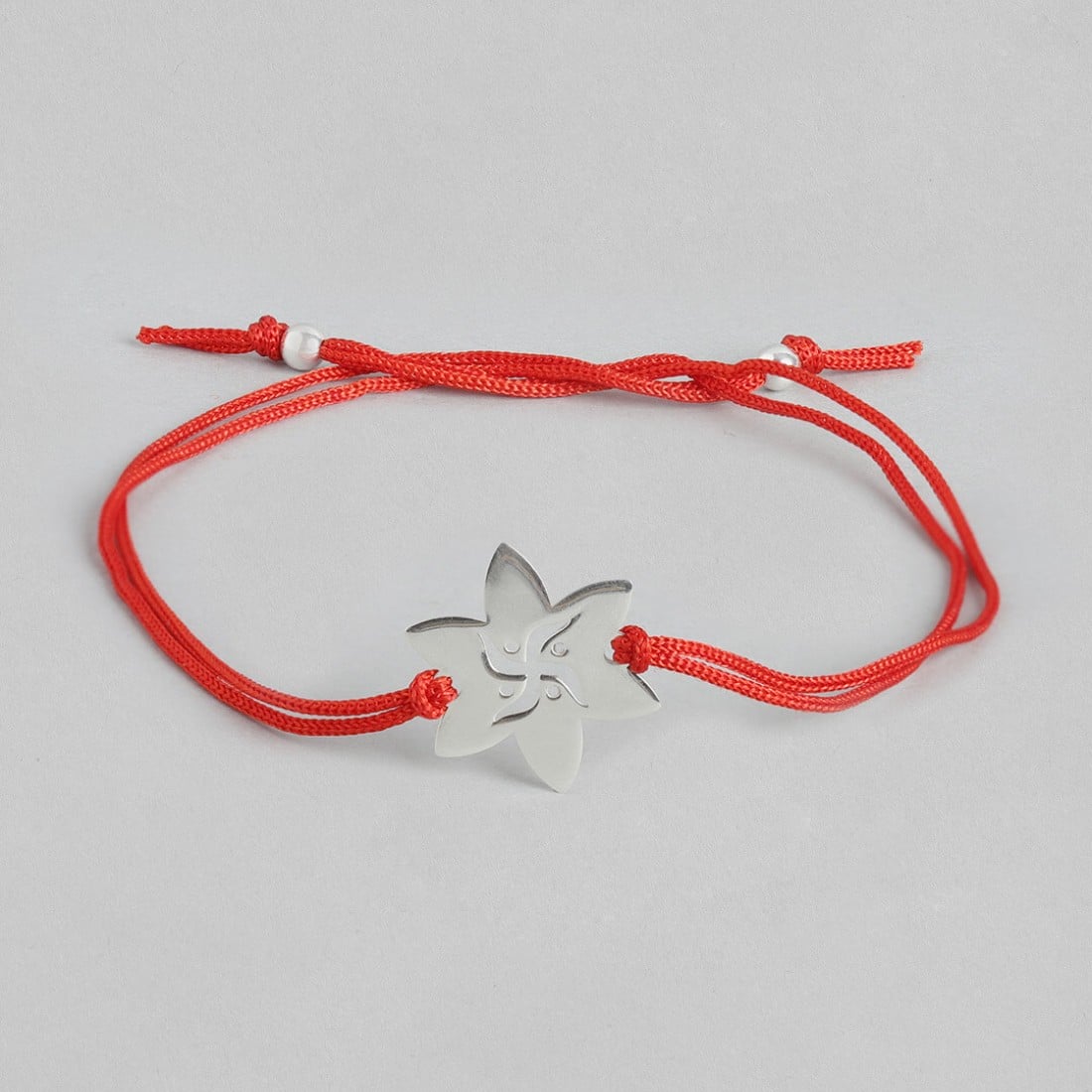 Swastika and Star Silver Rakhi