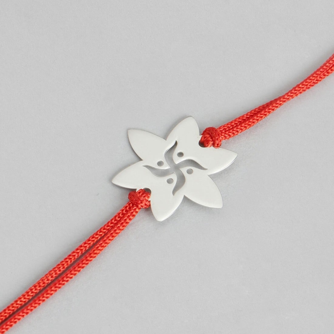Swastika and Star Silver Rakhi