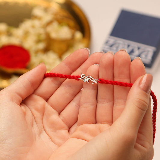 Divine Om & Trishul CZ Rhodium Plated Silver Thread Rakhi