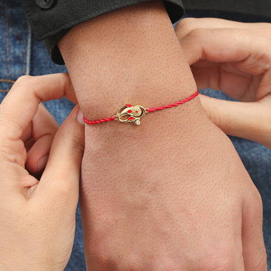 Auspicious Lord Ganesh Ji CZ Gold Plated Silver Thread Rakhi