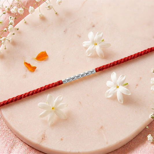 Elegant Beased Rhodium Plated Silver Rakhi