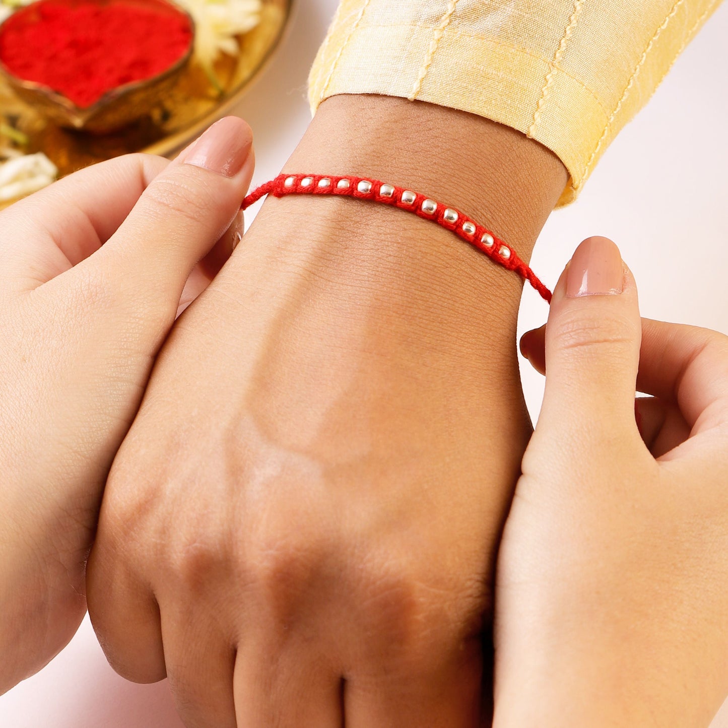 Woven Beads Radiant Silver Rakhi (ALVINA Signature)