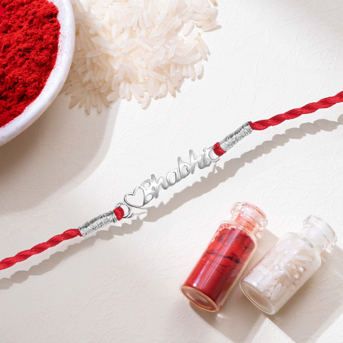 Elegant Bhabhi With Heart Charm Rhodium-Plated Thread Rakhi For Her