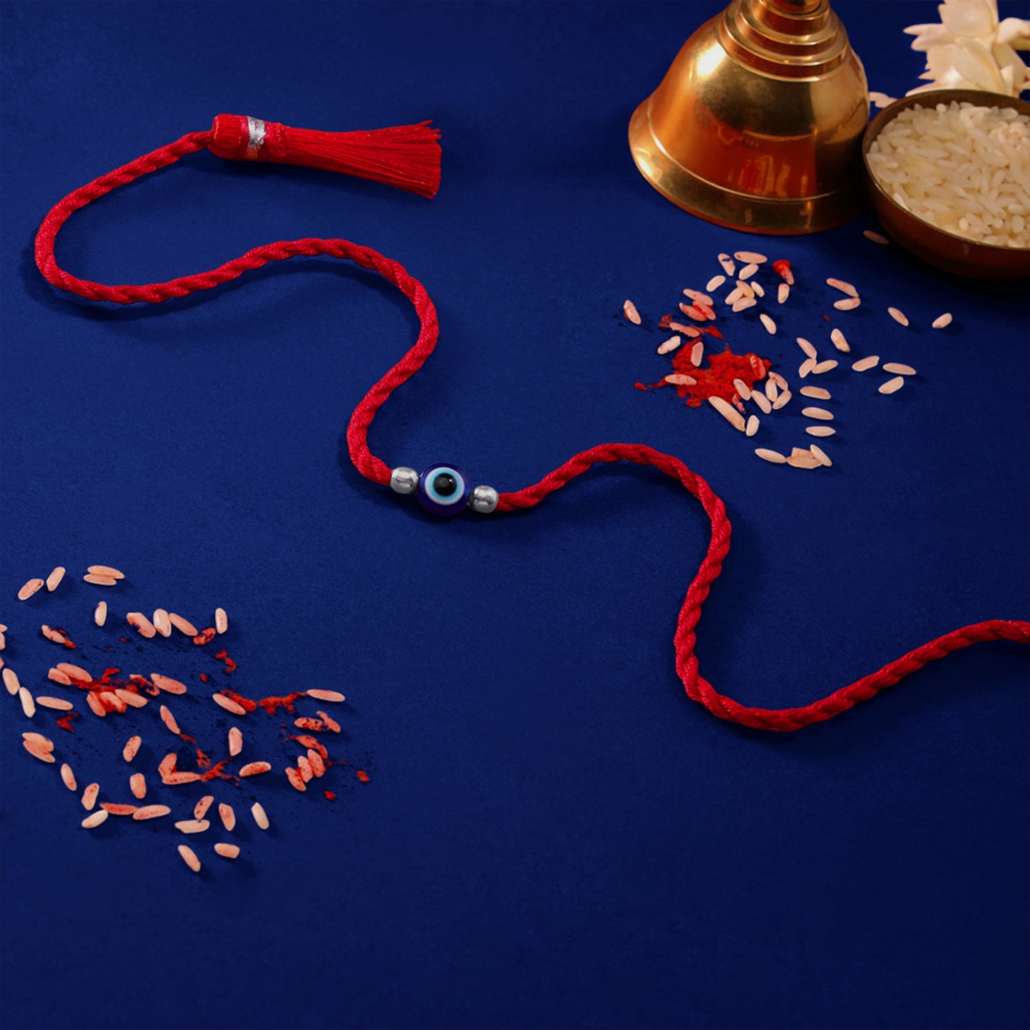 Evil Eye White Stone Silver Thread Rakhi (ALVINA Signature)