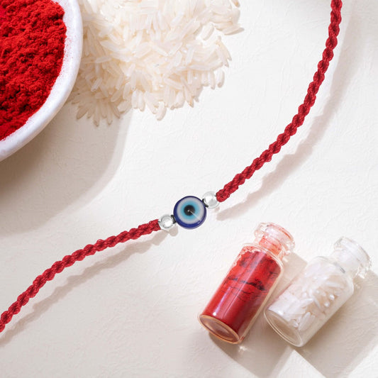 Evil Eye White Stone Silver Thread Rakhi (ALVINA Signature)