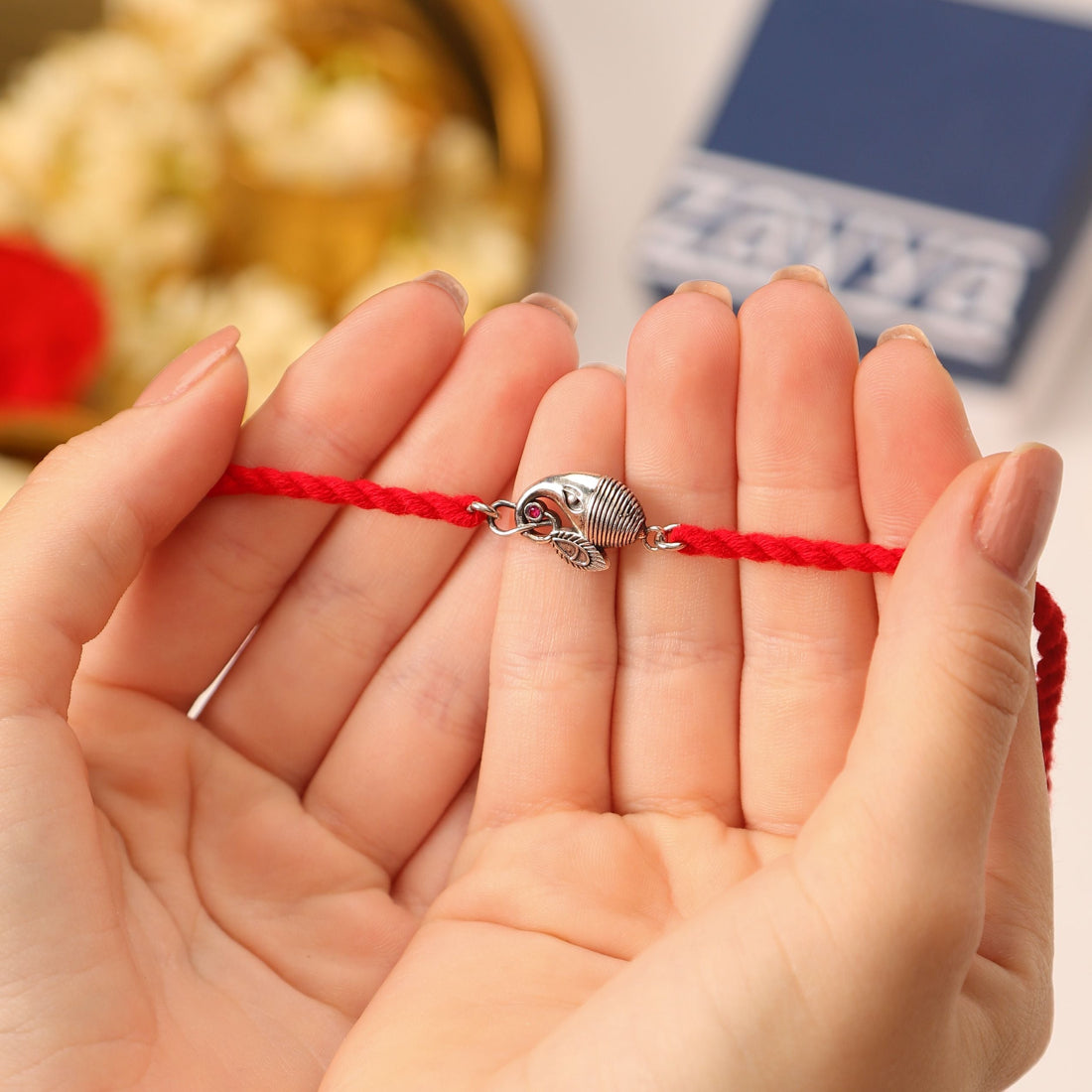 Divine Ganesh Ji Rhodium-Plated Silver Thread Rakhi