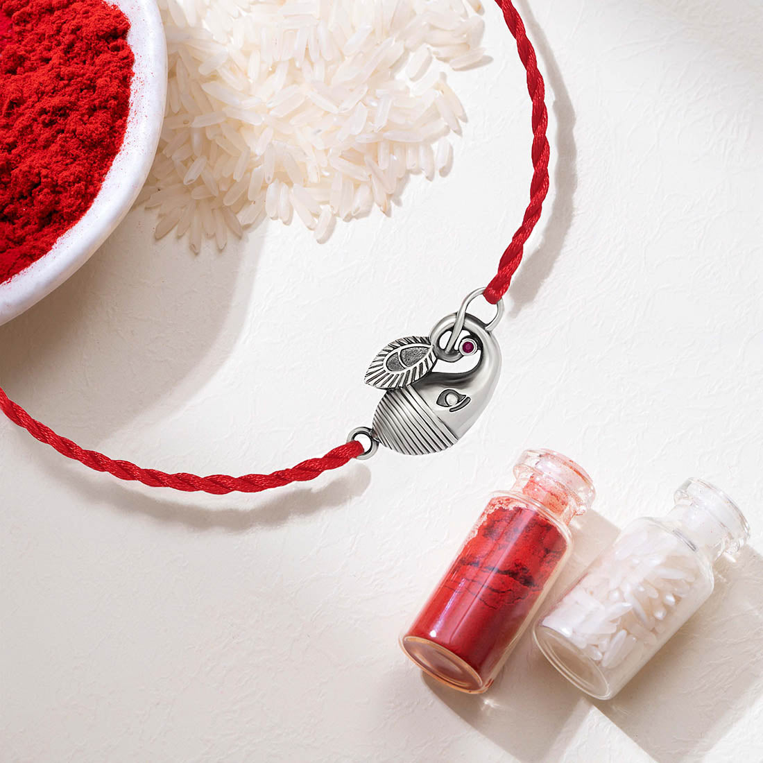 Divine Ganesh Ji Rhodium-Plated Sterling Silver Thread Rakhi