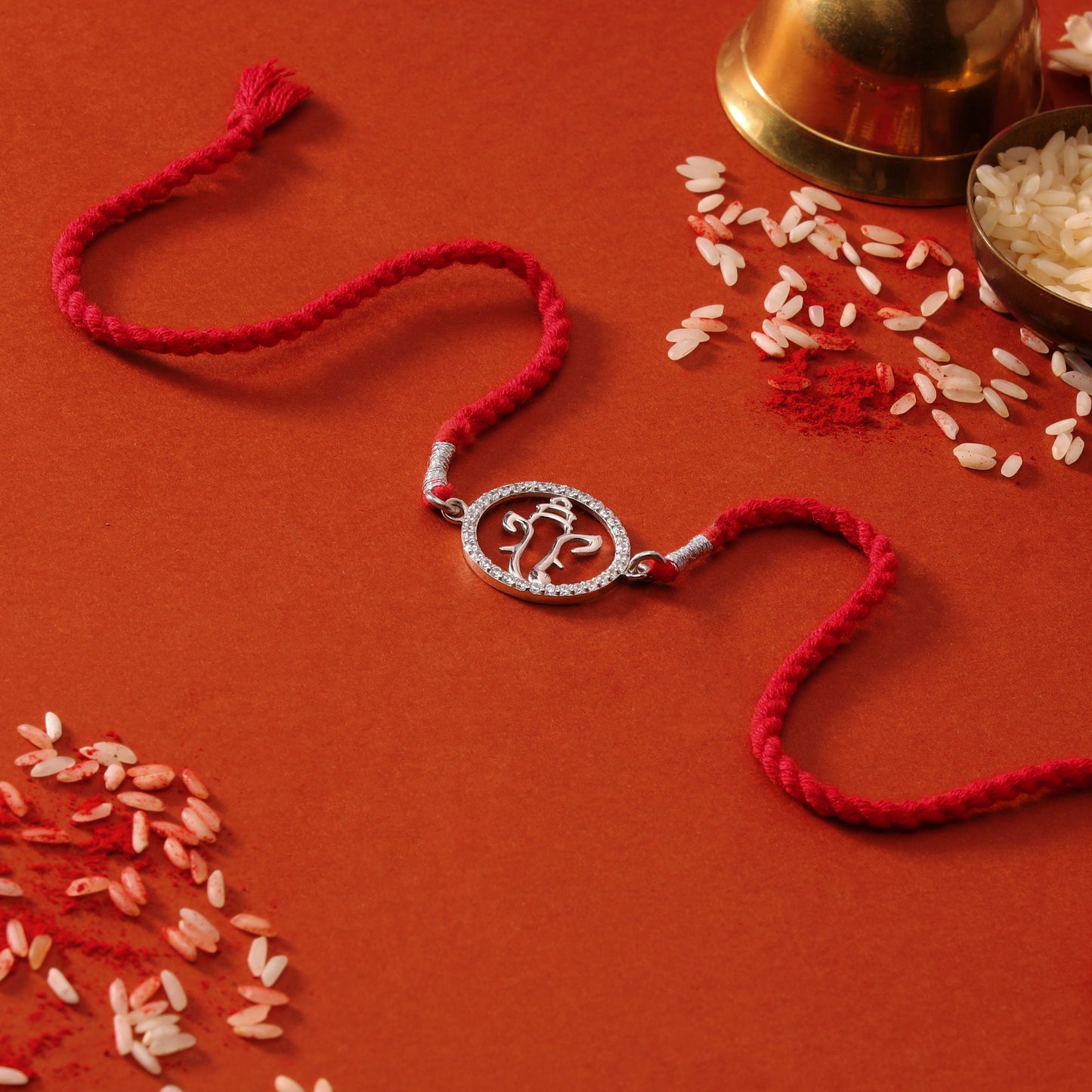 Radiant Ganesh Ji With CZ Silver Thread Rakhi