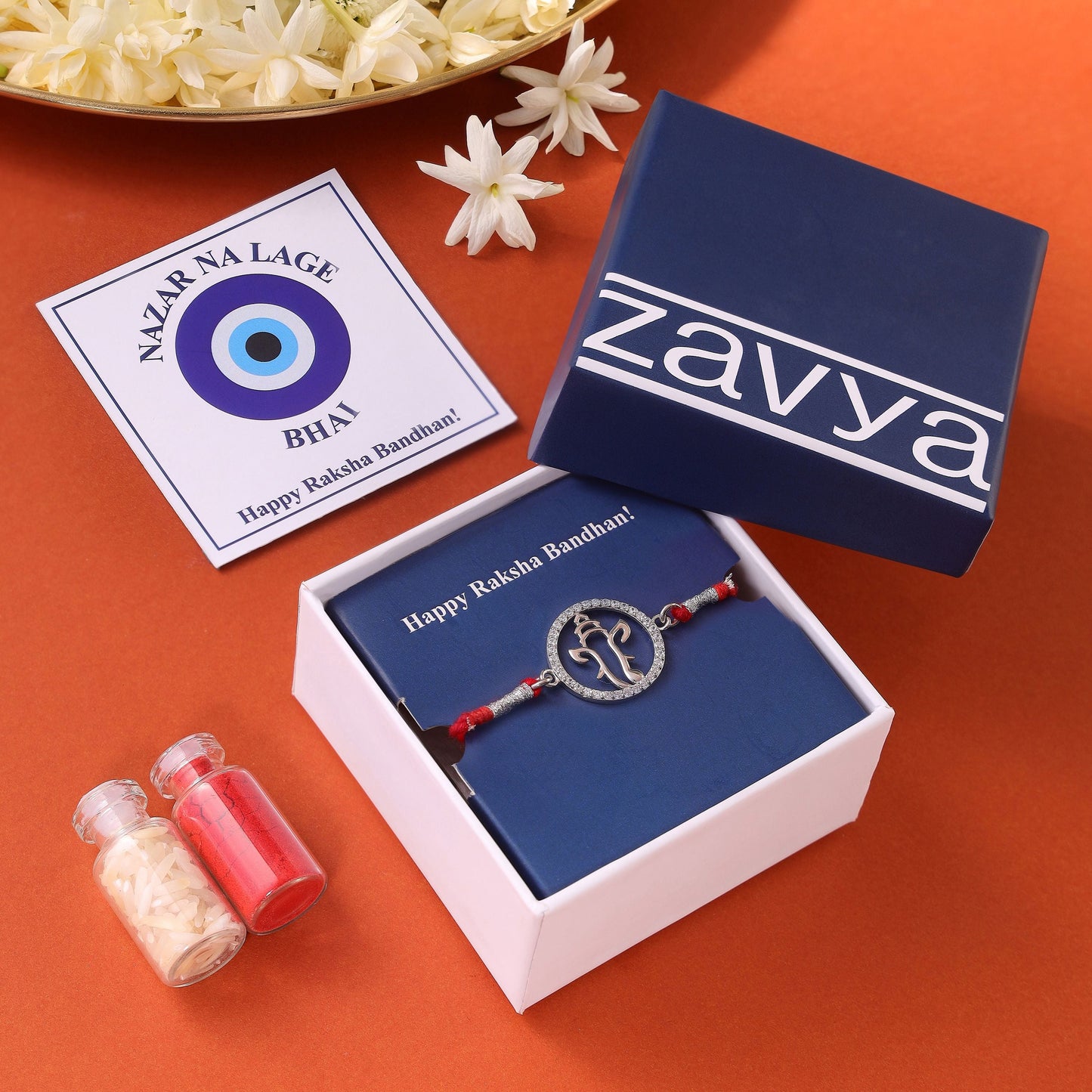 Radiant Ganesh Ji With CZ Silver Thread Rakhi