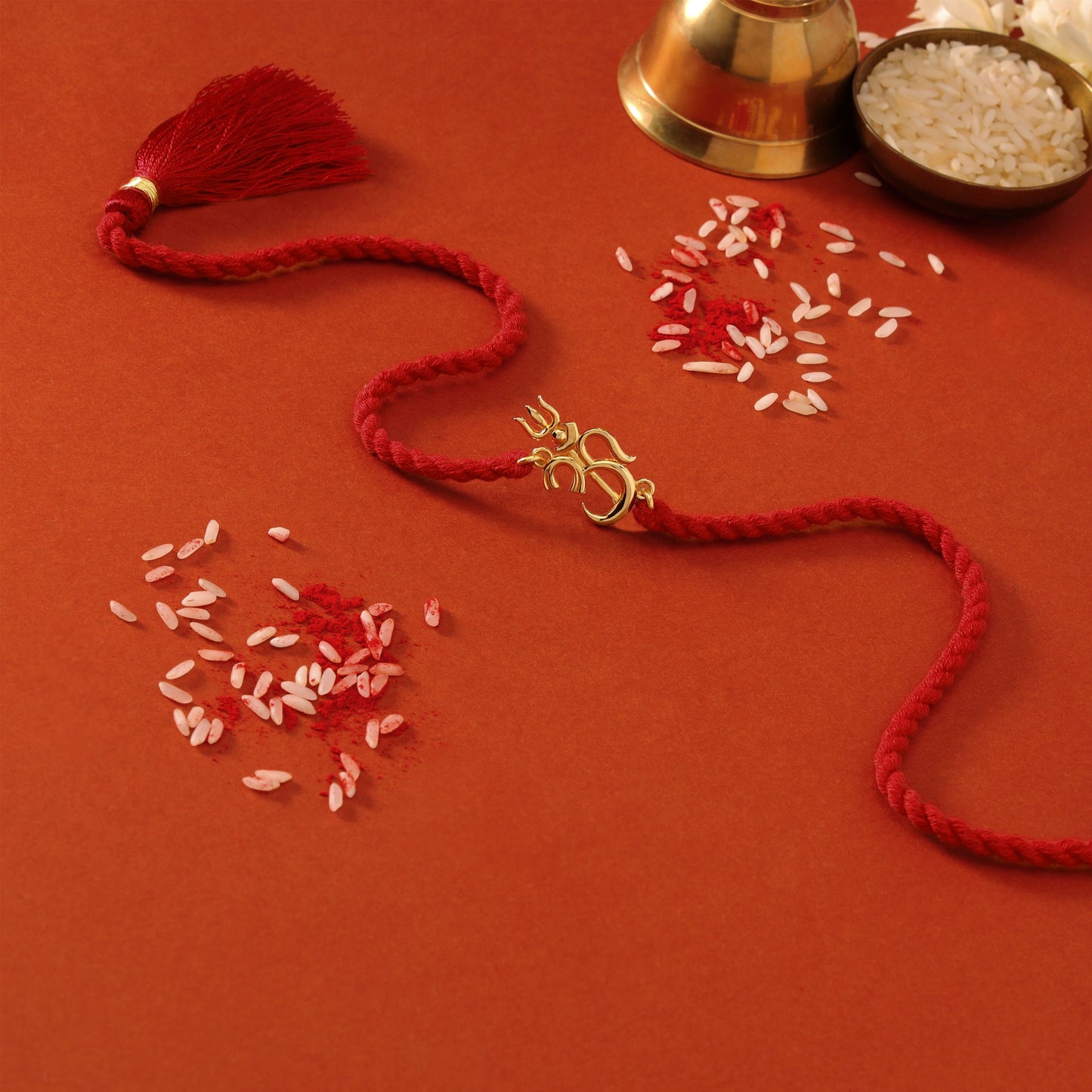 Om Trishul Charm Gold Plated Silver Rakhi (ALVINA Signature)