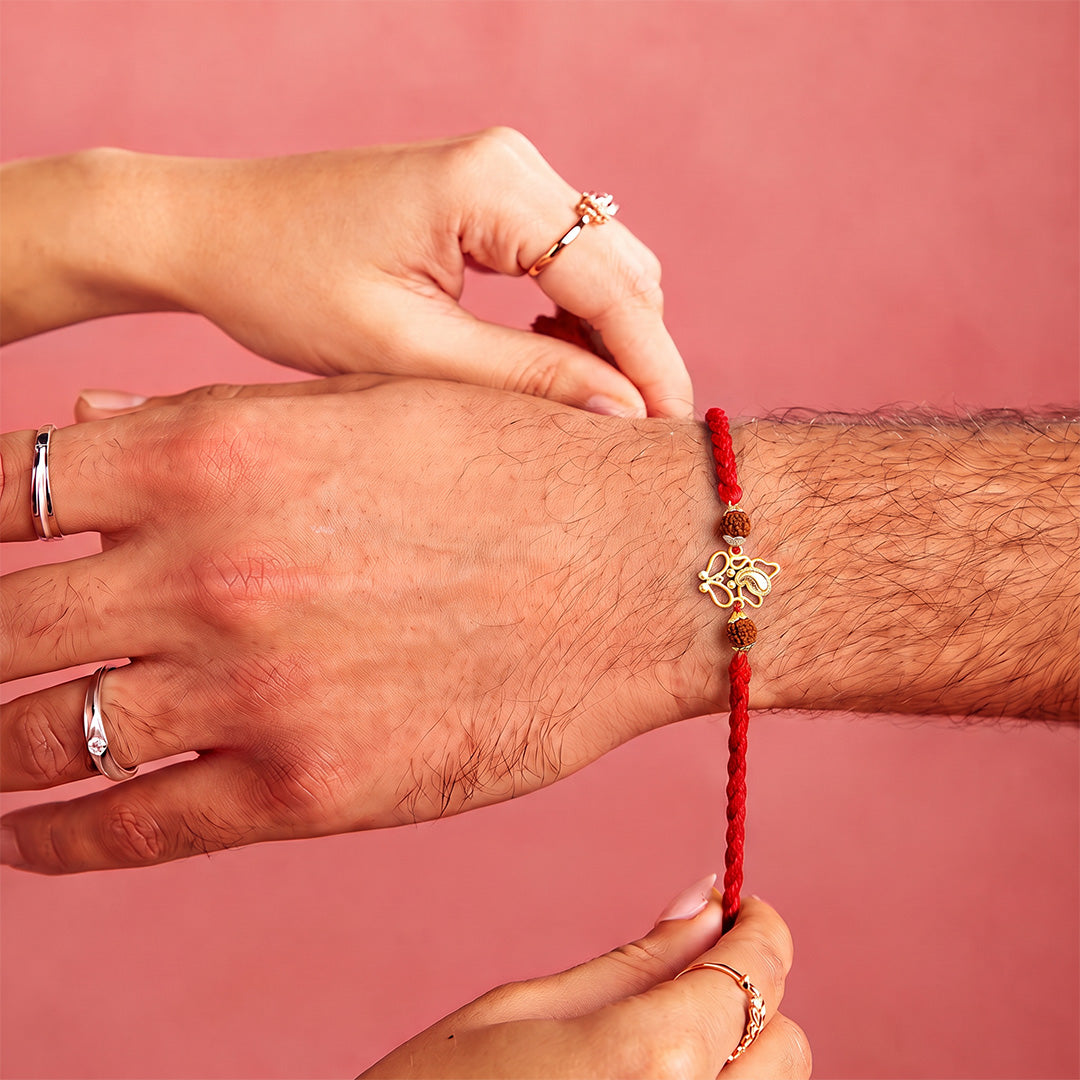 Divine Ganesha & Rudraksha Gold-Plated Silver Rakhi (ALVINA Signature)