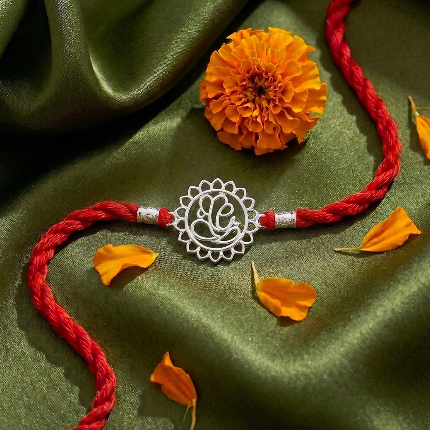 Divine Floral Ganesha Silver Rakhi (ALVINA Signature)
