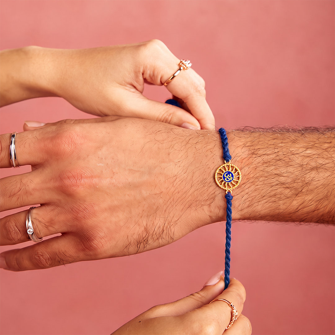 Divine Om Chakra Gold Plated Blue Enamel Silver Rakhi (ALVINA Signature)